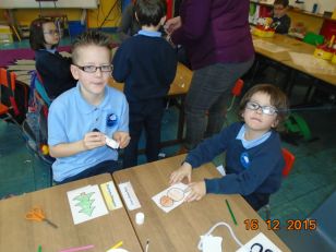 Our school Buddies helping P1&2 to get ready for Christmas